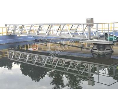 Half-bridge peripheral drive scraper and suction machine